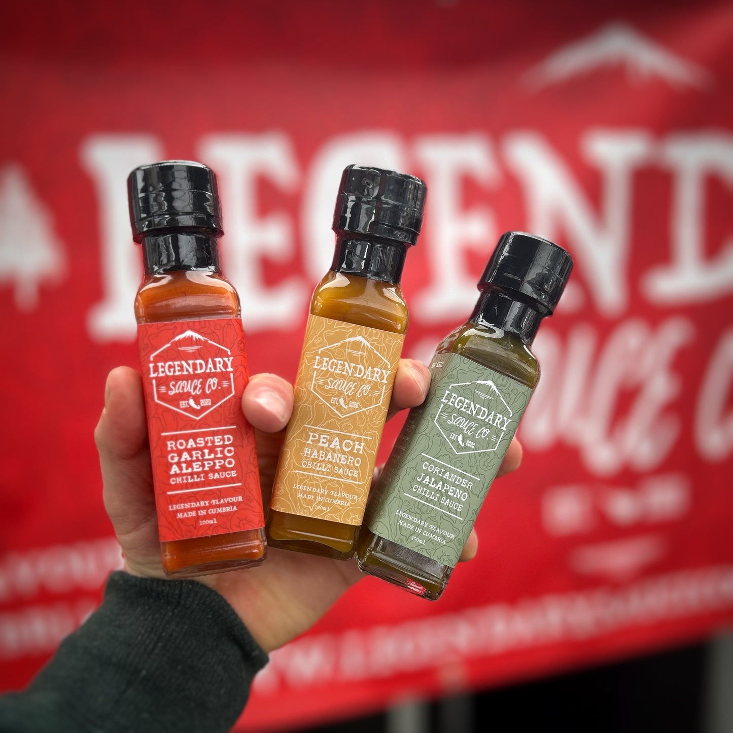 a photo showing 3 bottles of hot sauce