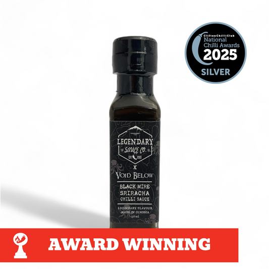 A bottle of Black Mire Sriracha Hot Sauce